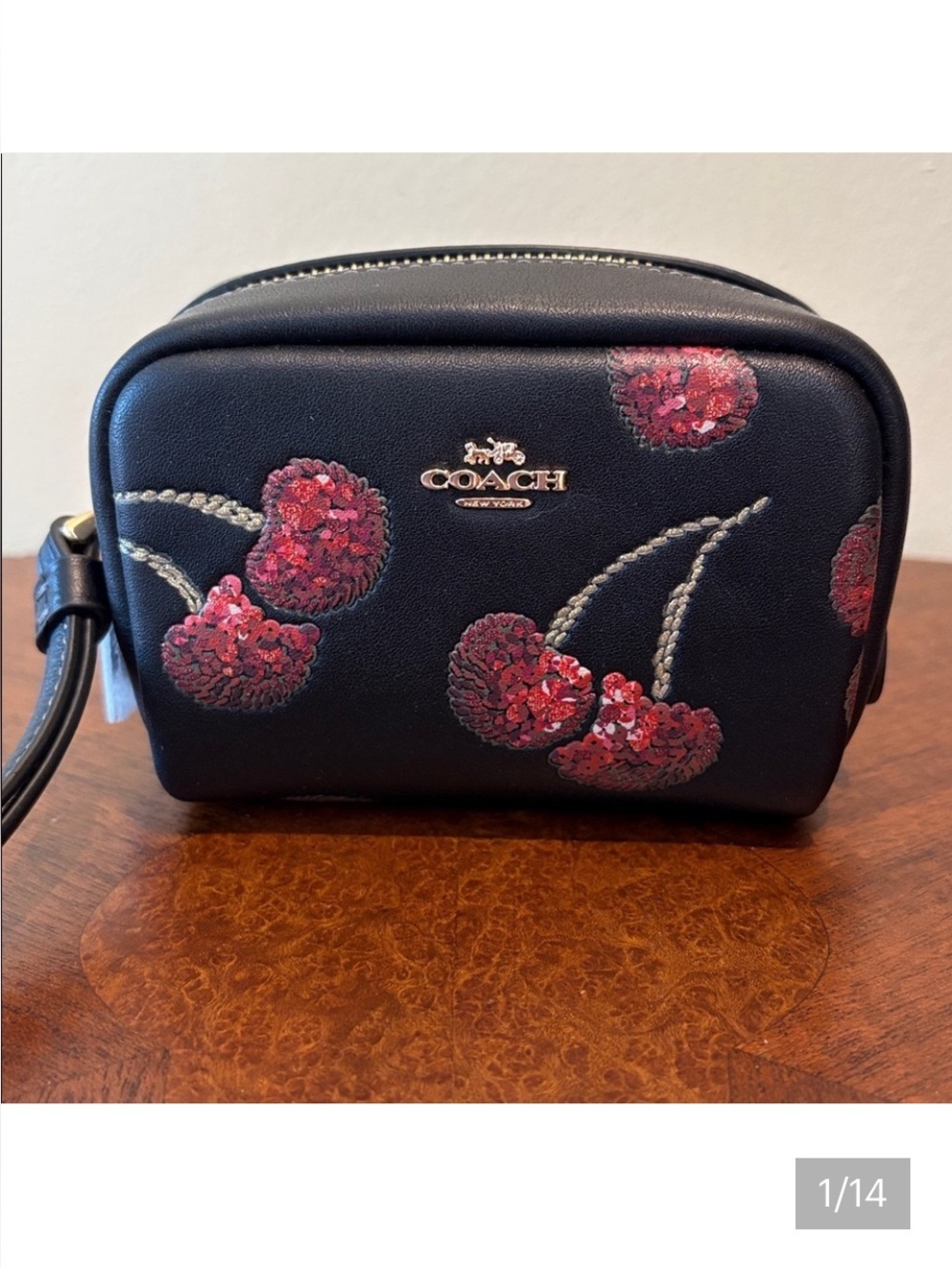 Coach wristlet pouch  black cherry print/ red/sparkles  gold tone hardware NWT